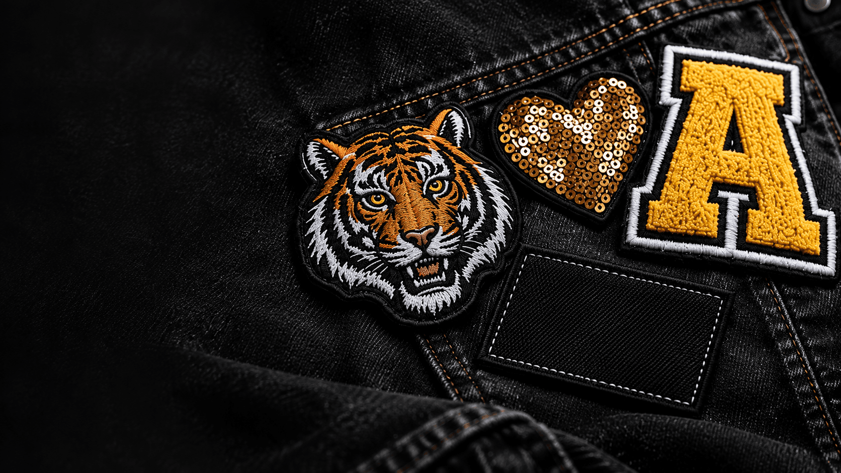 Custom embroidered, sequin and chenille patches on denim